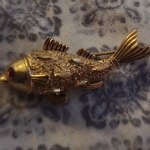 Trifari Gold Fish Brooch with Red Eye Accent